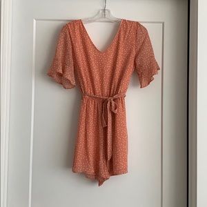 Ruffle sleeve romper with tie waist